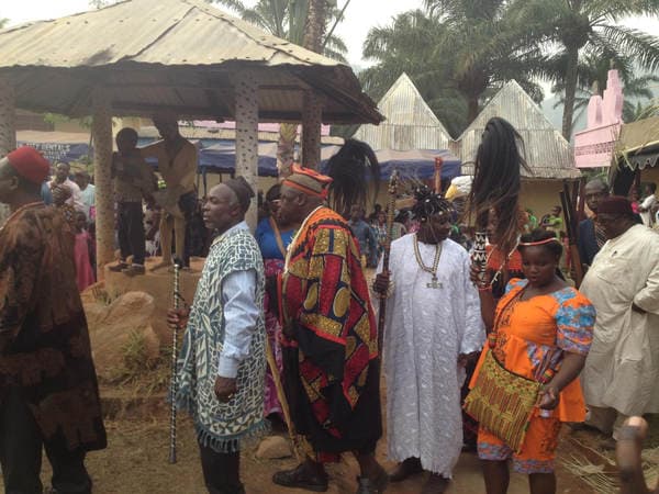 Sons and daughters of Guneku assembled on the palace grounds of the village on 27 February 2015 for the return of HRH Fomuki in younger and energetic clothing. — photograph from the Guneku Fondom archive