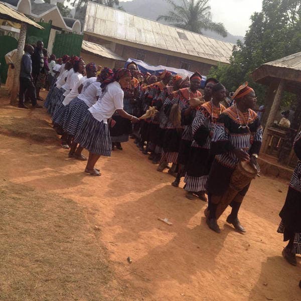 Sons and daughters of Guneku assembled on the palace grounds of the village on 27 February 2015 for the return of HRH Fomuki in younger and energetic clothing. — photograph from the Guneku Fondom archive