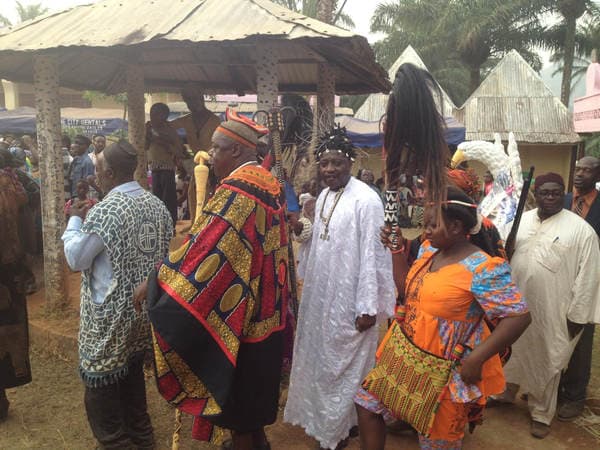 Sons and daughters of Guneku assembled on the palace grounds of the village on 27 February 2015 for the return of HRH Fomuki in younger and energetic clothing. — photograph from the Guneku Fondom archive