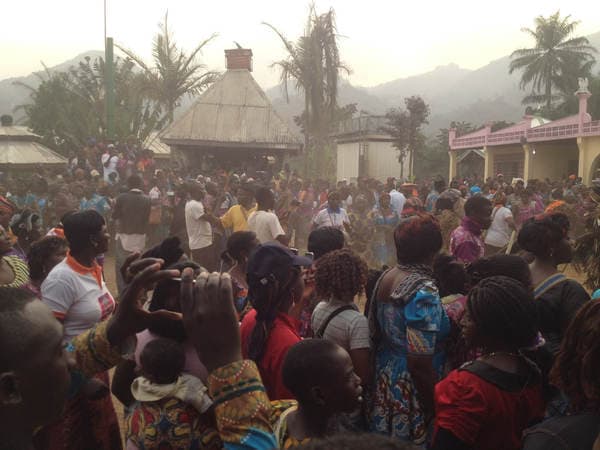 Sons and daughters of Guneku assembled on the palace grounds of the village on 27 February 2015 for the return of HRH Fomuki in younger and energetic clothing. — photograph from the Guneku Fondom archive