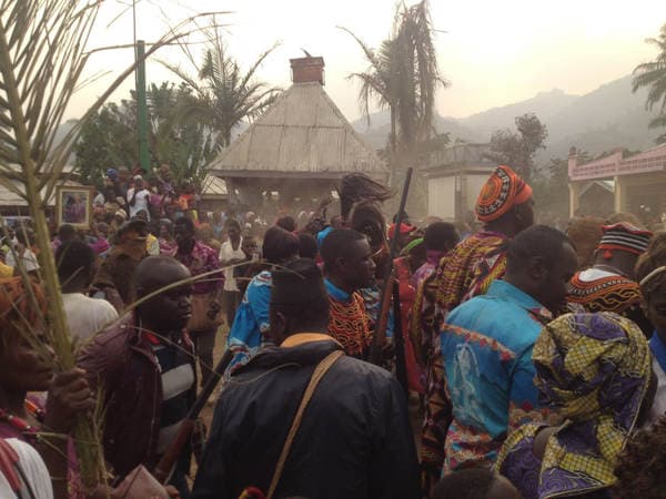 Sons and daughters of Guneku assembled on the palace grounds of the village on 27 February 2015 for the return of HRH Fomuki in younger and energetic clothing. — photograph from the Guneku Fondom archive
