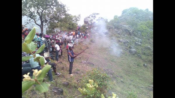 Sons and daughters of Guneku assembled on the palace grounds of the village on 27 February 2015 for the return of HRH Fomuki in younger and energetic clothing. — photograph from the Guneku Fondom archive