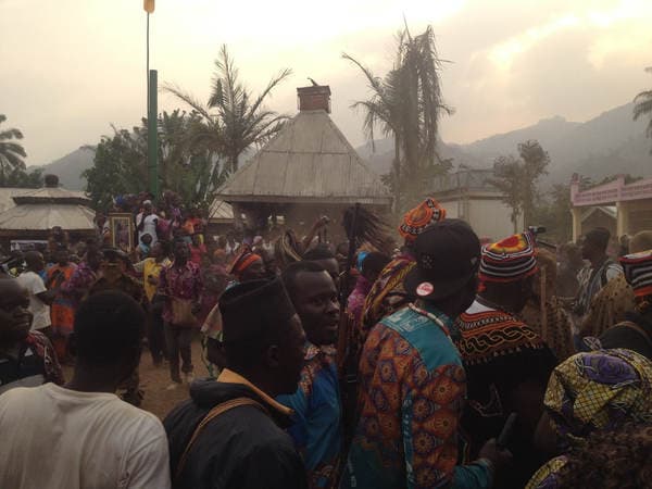Sons and daughters of Guneku assembled on the palace grounds of the village on 27 February 2015 for the return of HRH Fomuki in younger and energetic clothing. — photograph from the Guneku Fondom archive