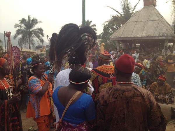 Sons and daughters of Guneku assembled on the palace grounds of the village on 27 February 2015 for the return of HRH Fomuki in younger and energetic clothing. — photograph from the Guneku Fondom archive