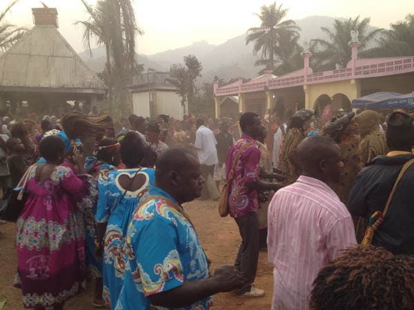 Sons and daughters of Guneku assembled on the palace grounds of the village on 27 February 2015 for the return of HRH Fomuki in younger and energetic clothing. — photograph from the Guneku Fondom archive