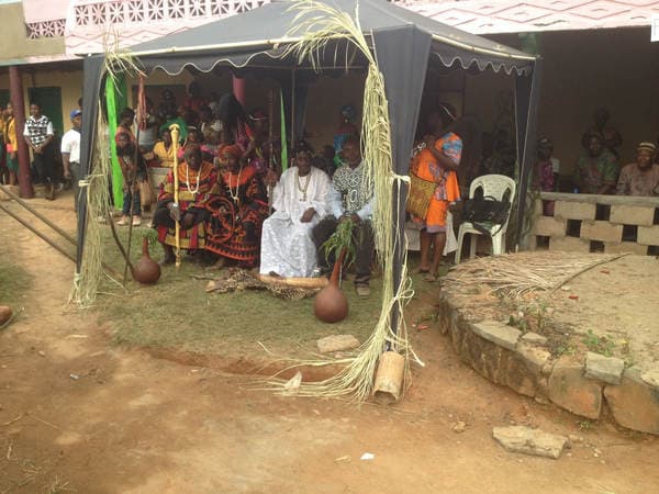 Sons and daughters of Guneku assembled on the palace grounds of the village on 27 February 2015 for the return of HRH Fomuki in younger and energetic clothing. — photograph from the Guneku Fondom archive