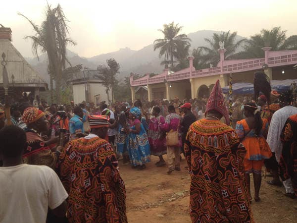 Sons and daughters of Guneku assembled on the palace grounds of the village on 27 February 2015 for the return of HRH Fomuki in younger and energetic clothing. — photograph from the Guneku Fondom archive