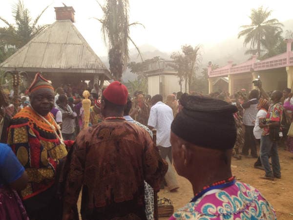 Sons and daughters of Guneku assembled on the palace grounds of the village on 27 February 2015 for the return of HRH Fomuki in younger and energetic clothing. — photograph from the Guneku Fondom archive