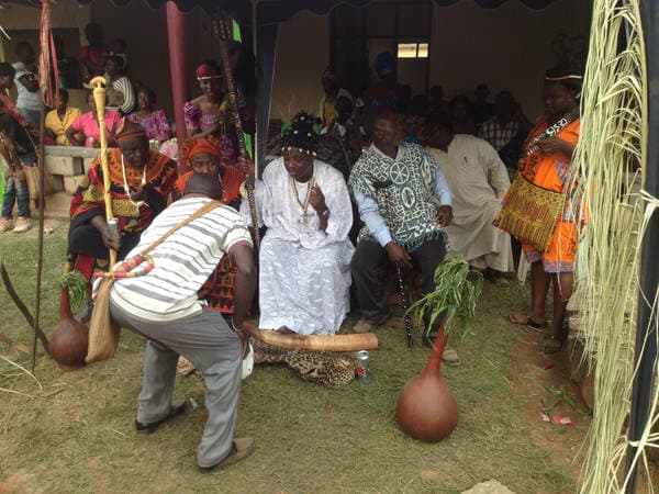 Sons and daughters of Guneku assembled on the palace grounds of the village on 27 February 2015 for the return of HRH Fomuki in younger and energetic clothing. — photograph from the Guneku Fondom archive