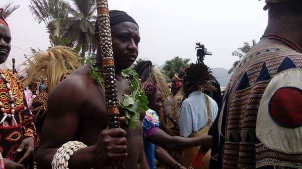 Sons and daughters of Guneku assembled on the palace grounds of the village on 27 February 2015 for the return of HRH Fomuki in younger and energetic clothing. — photograph from the Guneku Fondom archive