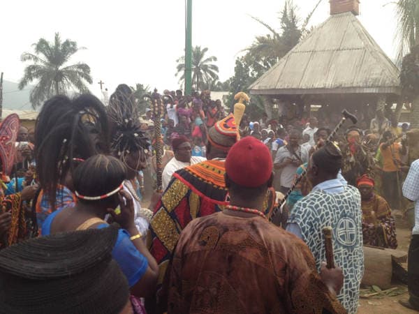 Sons and daughters of Guneku assembled on the palace grounds of the village on 27 February 2015 for the return of HRH Fomuki in younger and energetic clothing. — photograph from the Guneku Fondom archive