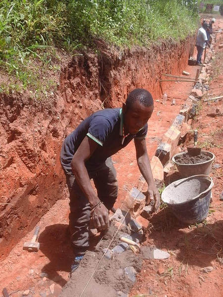 THE TONMUKOM - WINDIK ROAD WORK — photograph from the Guneku Fondom archive